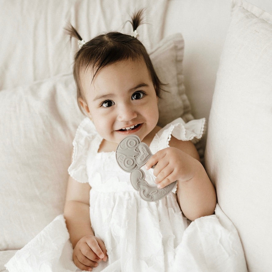 Tiki, Tiki teether, Teether, Baby teether, Maori baby teether, maori teether, easy to hold, food grade silicone, bpa free, phthalate free, babies, teething, cultural baby products