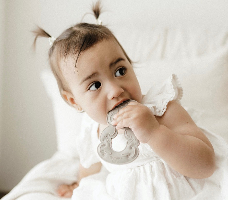 Tiki, Tiki teether, Teether, Baby teether, Maori baby teether, maori teether, easy to hold, food grade silicone, bpa free, phthalate free, babies, teething, cultural baby products