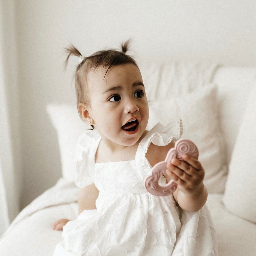 Tiki, Tiki teether, Teether, Baby teether, Maori baby teether, maori teether, easy to hold, food grade silicone, bpa free, phthalate free, babies, teething, cultural baby products