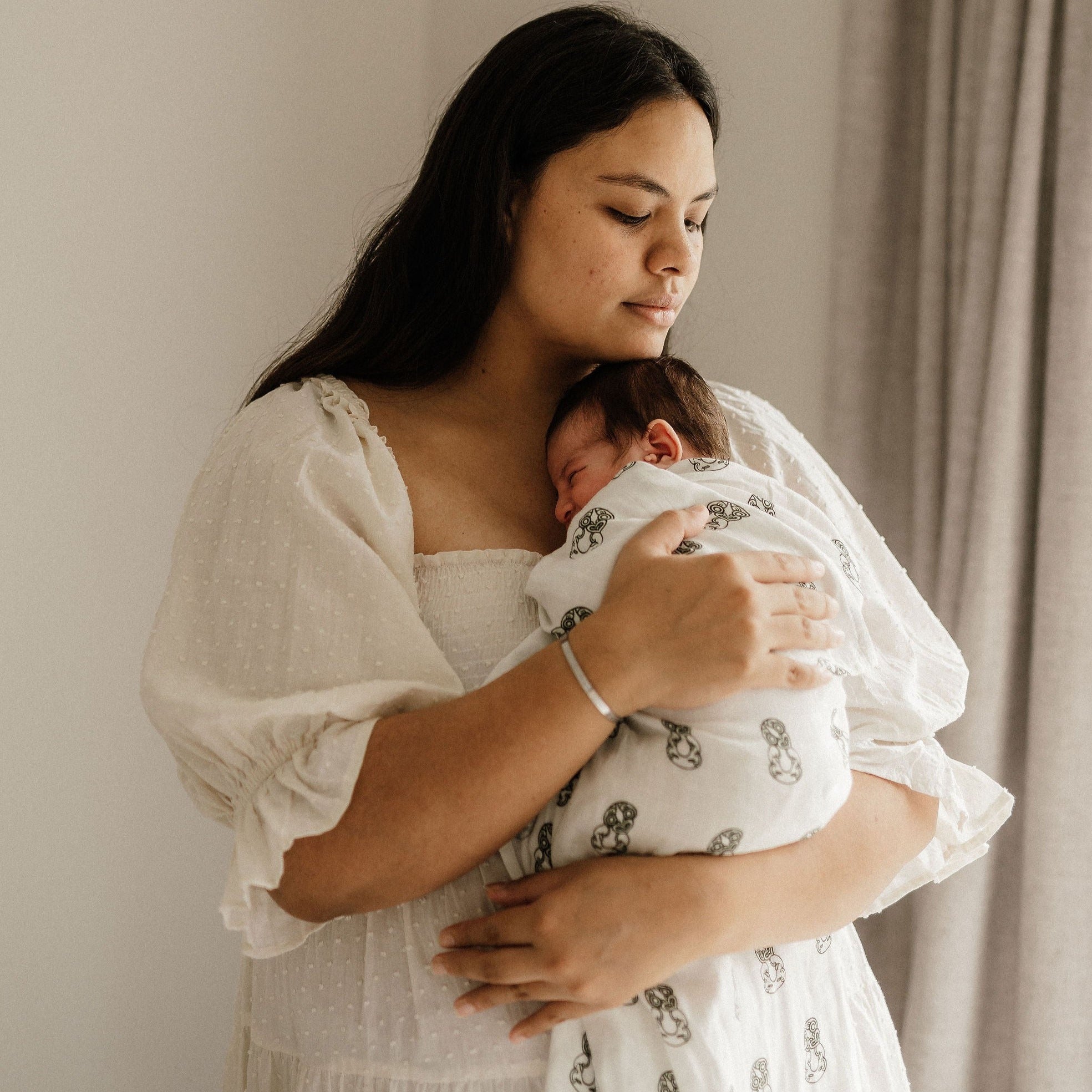 Māori baby, maori, cultural baby, baby wrap, pepe wrap, pēpi wrap, swaddle, feeding cover, nursing cover, shade cloth, baby shade cloth, light baby blanket, bamboo and cotton blend, cultural baby, burp cloth, Māori pēpi wrap, Tiki, Tiki baby