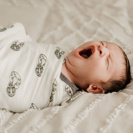 Māori baby, maori, cultural baby, baby wrap, pepe wrap, pēpi wrap, swaddle, feeding cover, nursing cover, shade cloth, baby shade cloth, light baby blanket, bamboo and cotton blend, cultural baby, burp cloth, Māori pēpi wrap, Tiki, Tiki baby