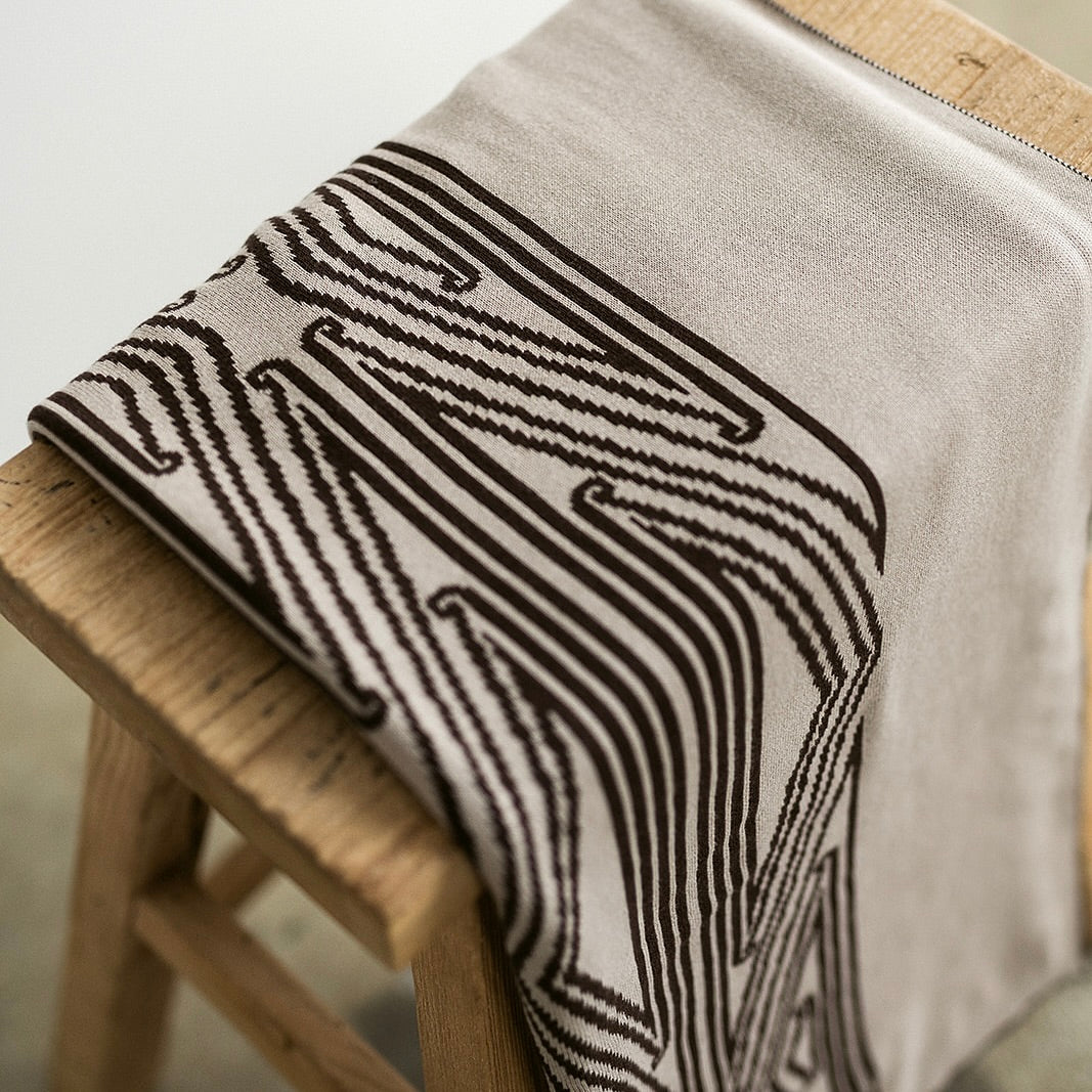 Throw blanket, sofa throw, decorative blanket, home textile, Māori-inspired design, Māori patterns, geometric motifs, koru patterns, earthy tones, brown and beige, natural colours, vibrant colours, Contemporary, minimalist, statement piece, cultural design, Living room décor, sofa styling, cosy home, bedroom styling, commercial gifting, gift box, māori, maori, premium throw blanket, Māori paraikete, authentic Māori, whare, kāinga