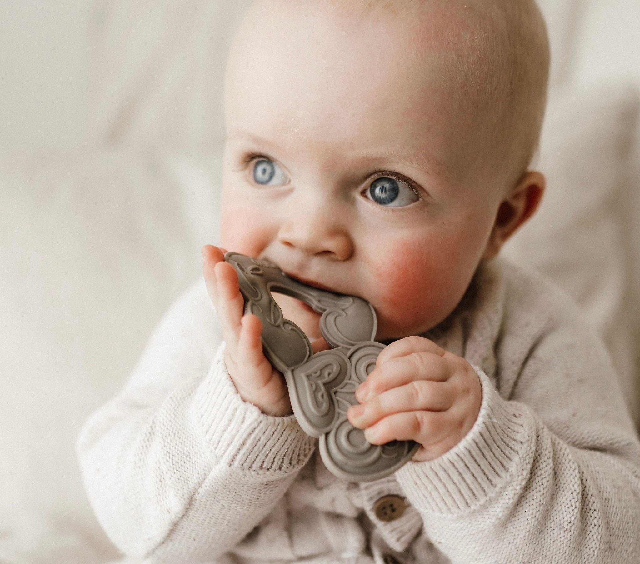 Tiki, Tiki teether, Teether, Baby teether, Maori baby teether, maori teether, easy to hold, food grade silicone, bpa free, phthalate free, babies, teething, cultural baby products
