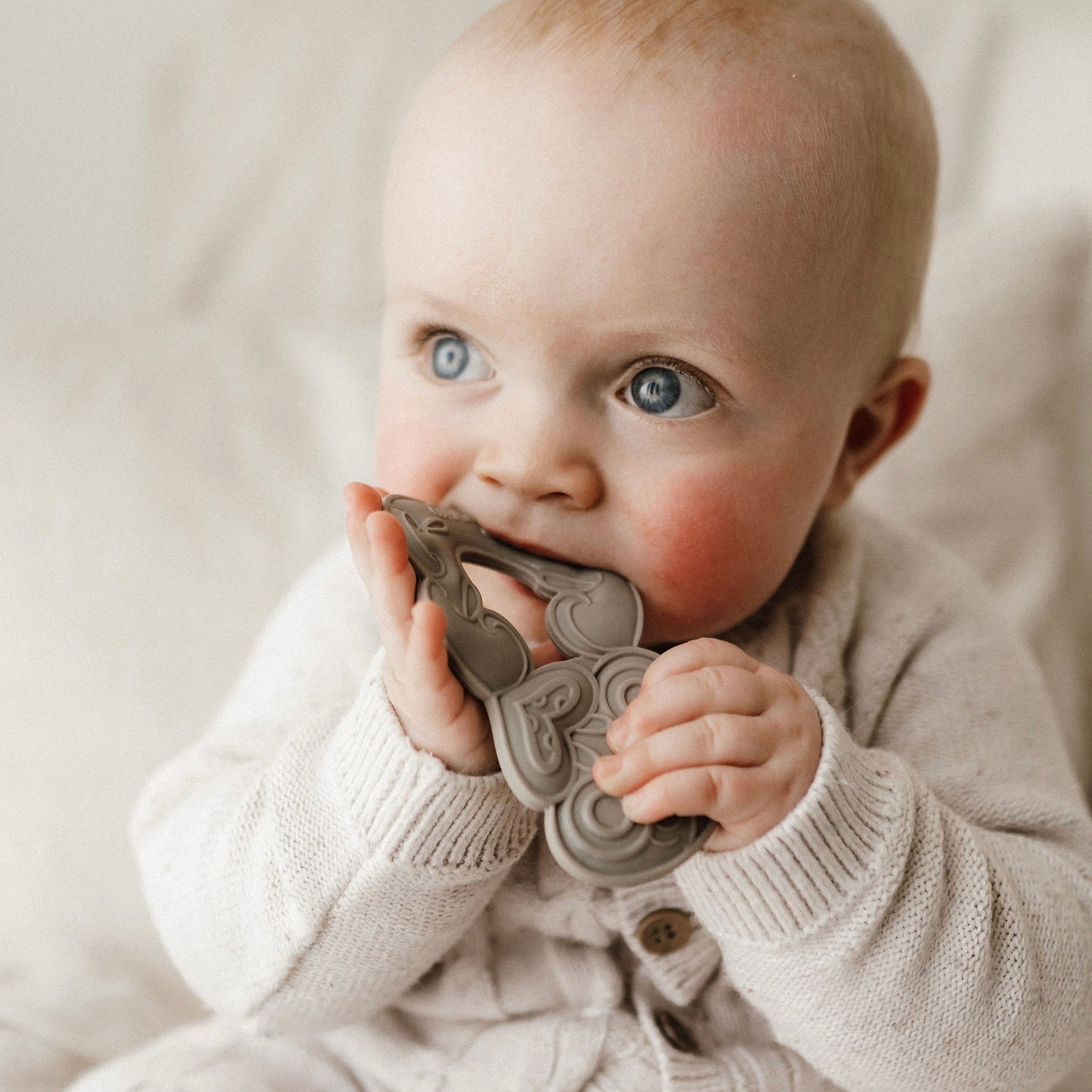 Tiki, Tiki teether, Teether, Baby teether, Maori baby teether, maori teether, easy to hold, food grade silicone, bpa free, phthalate free, babies, teething, cultural baby products