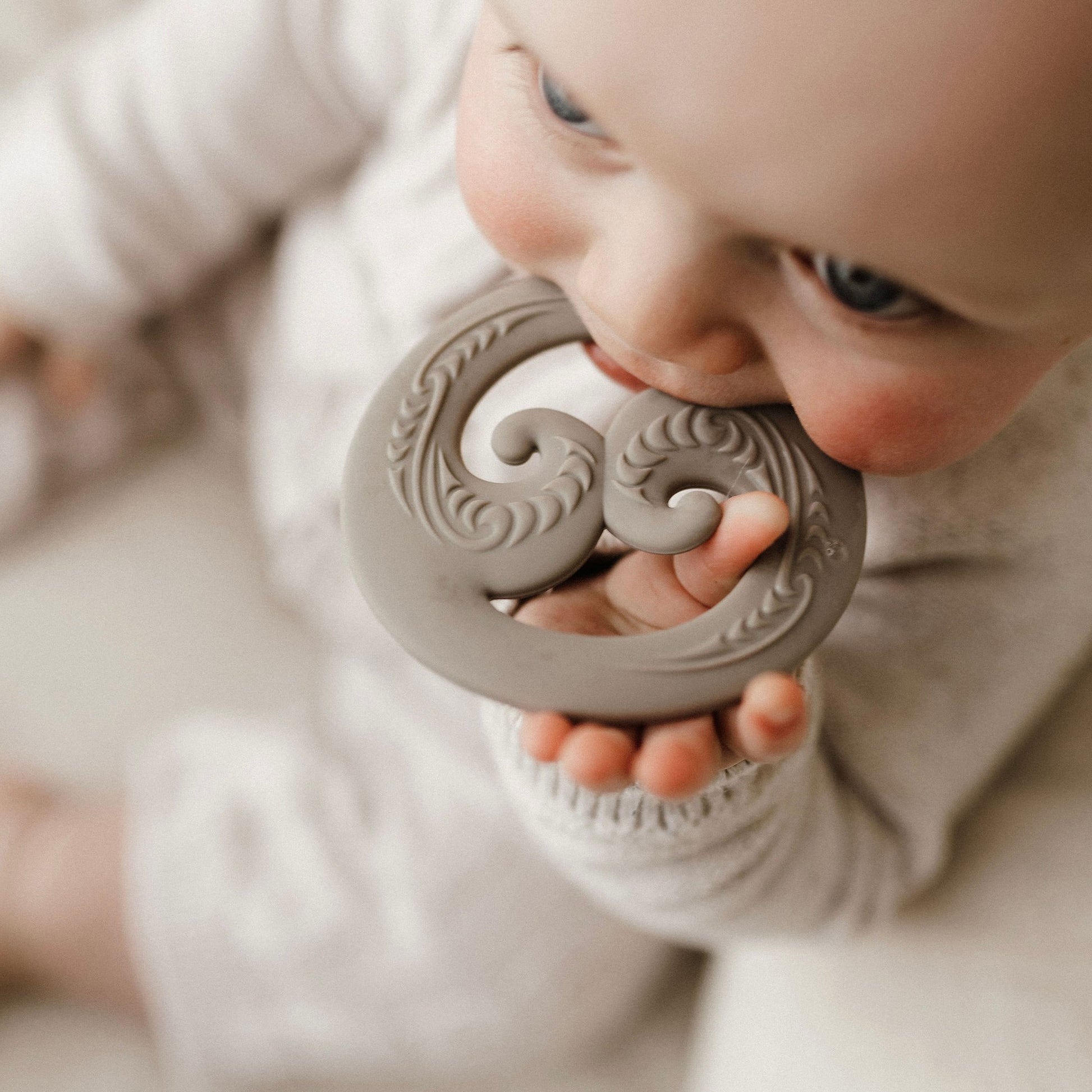 koru, baby toy, koru teether, Teether, Baby teether, Maori baby teether, maori teether, easy to hold, food grade silicone, bpa free, phthalate free, babies, teething, cultural baby products