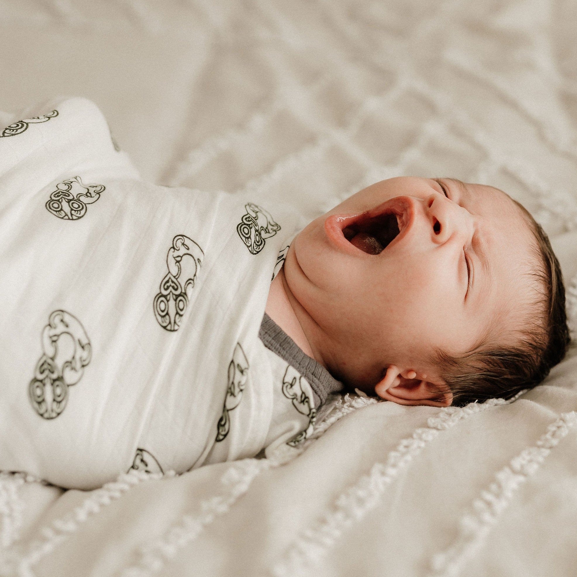 Māori baby, maori, cultural baby, baby wrap, pepe wrap, pēpi wrap, swaddle, feeding cover, nursing cover, shade cloth, baby shade cloth, light baby blanket, bamboo and cotton blend, cultural baby, burp cloth, Māori pēpi wrap, Tiki, Tiki baby