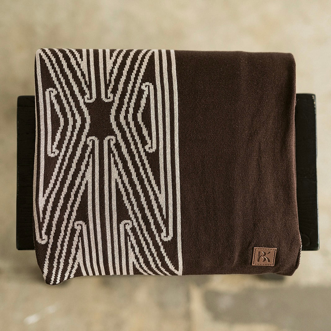 Throw blanket, sofa throw, decorative blanket, home textile, Māori-inspired design, Māori patterns, geometric motifs, koru patterns, earthy tones, brown and beige, natural colours, vibrant colours, Contemporary, minimalist, statement piece, cultural design, Living room décor, sofa styling, cosy home, bedroom styling, commercial gifting, gift box, māori, maori, premium throw blanket, Māori paraikete, authentic Māori, whare, kāinga