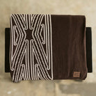 Throw blanket, sofa throw, decorative blanket, home textile, Māori-inspired design, Māori patterns, geometric motifs, koru patterns, earthy tones, brown and beige, natural colours, vibrant colours, Contemporary, minimalist, statement piece, cultural design, Living room décor, sofa styling, cosy home, bedroom styling, commercial gifting, gift box, māori, maori, premium throw blanket, Māori paraikete, authentic Māori, whare, kāinga