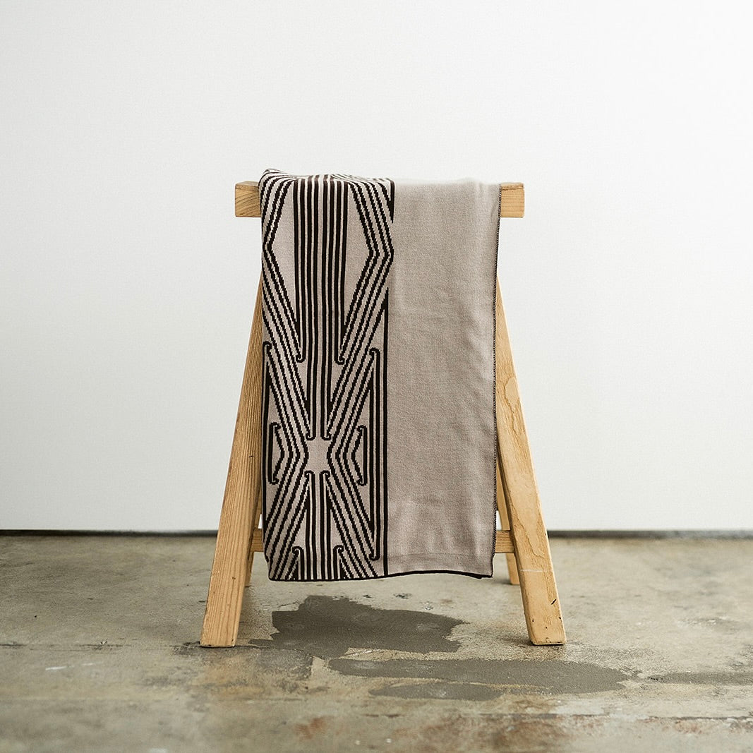 Throw blanket, sofa throw, decorative blanket, home textile, Māori-inspired design, Māori patterns, geometric motifs, koru patterns, earthy tones, brown and beige, natural colours, vibrant colours, Contemporary, minimalist, statement piece, cultural design, Living room décor, sofa styling, cosy home, bedroom styling, commercial gifting, gift box, māori, maori, premium throw blanket, Māori paraikete, authentic Māori, whare, kāinga