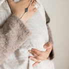 Māori baby, maori, cultural baby, baby wrap, pepe wrap, pēpi wrap, swaddle, feeding cover, nursing cover, shade cloth, baby shade cloth, light baby blanket, bamboo and cotton blend, cultural baby, burp cloth, Māori pēpi wrap